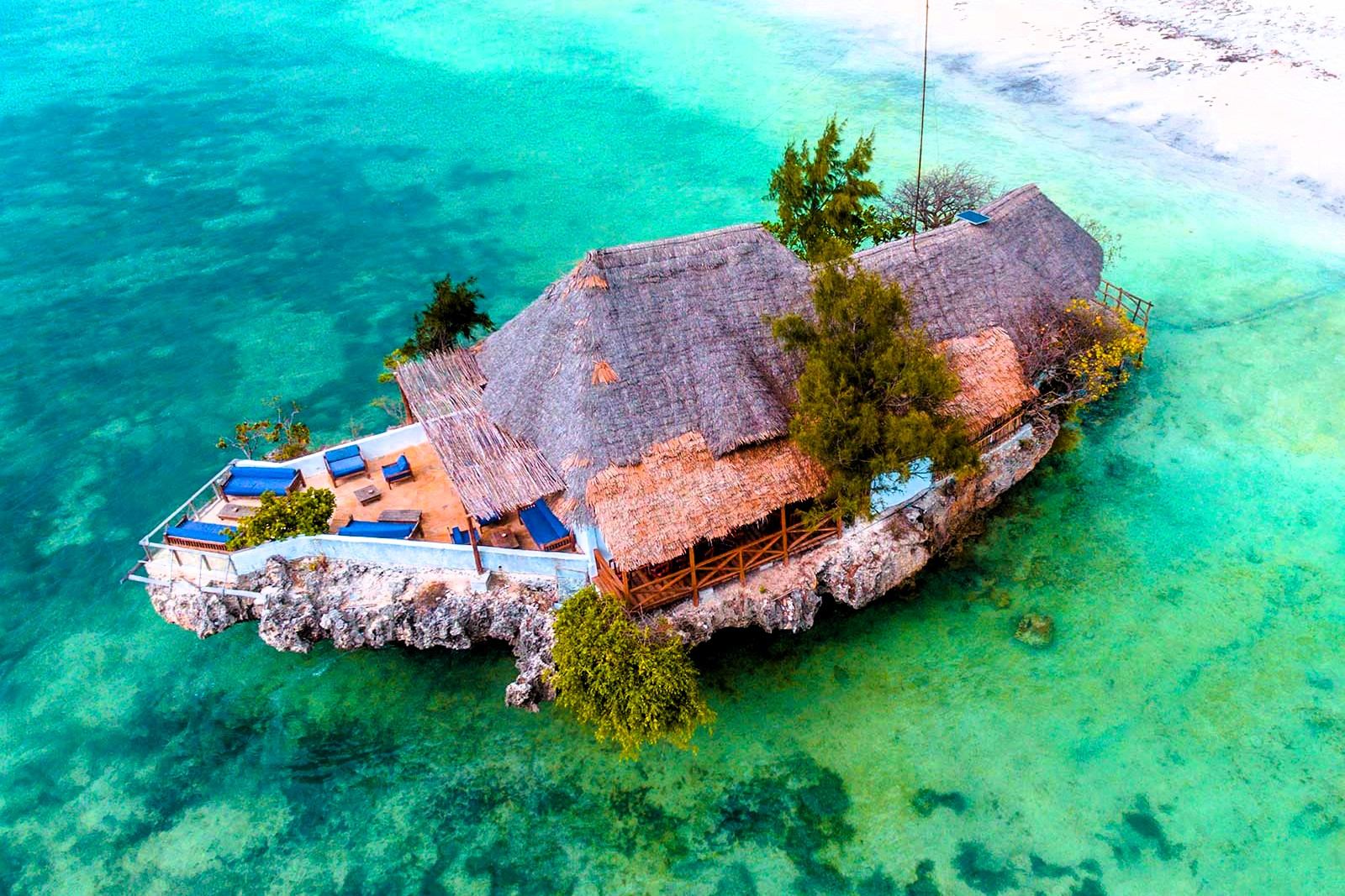 The Rock Restaurant on a small coral islet in turquoise sea